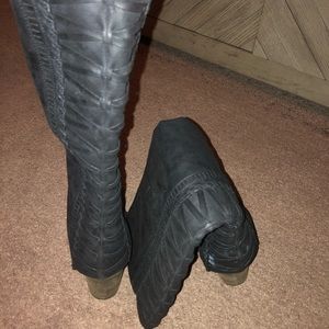Woman’s knee high boots
